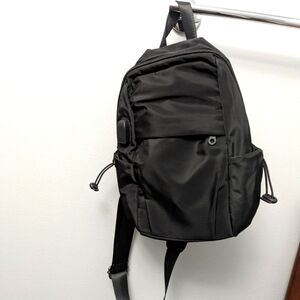 NEW USB Port Backpack/Sling Bag/Cross Body Bag.